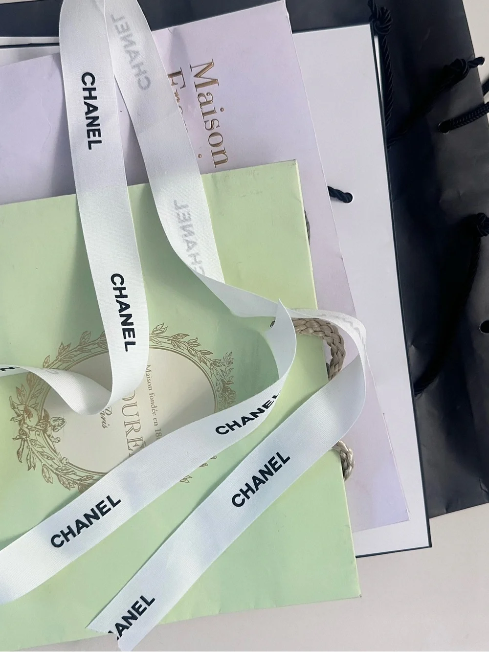 Luxury shopping bag Laduree, Chanel, MFK Kurdjian shopping bag
